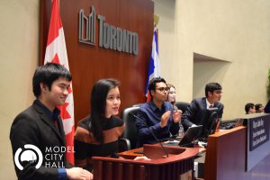 Student debating at podium